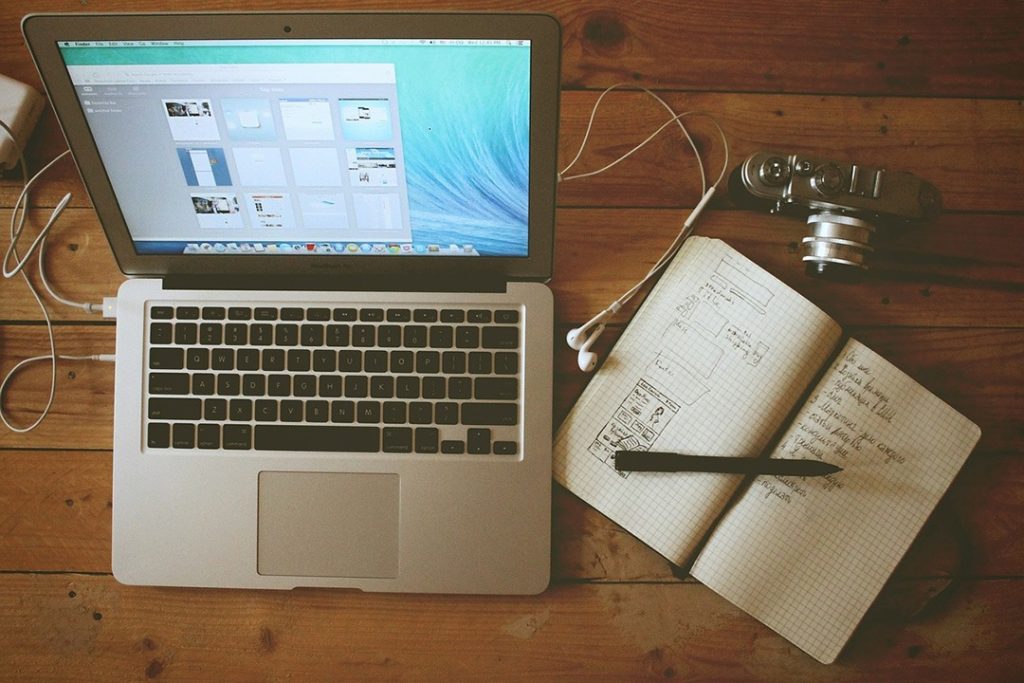 Our products and services Laptop and notepad products on desk