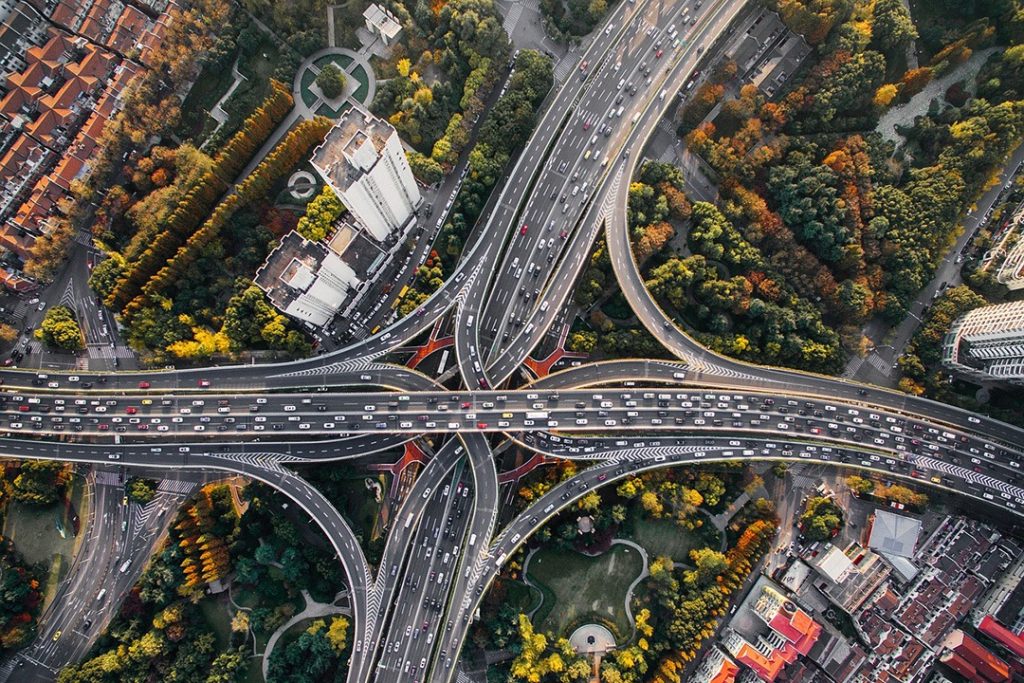 Aerial view of highway intersection in city