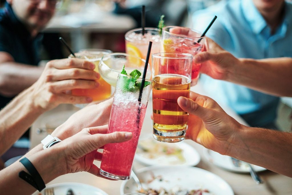 People celebrating while drinking