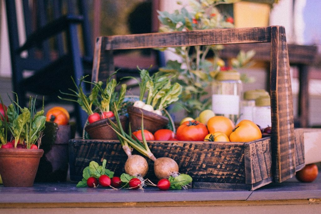 The best vegetables to grow indoors Vegetables on a wooden table