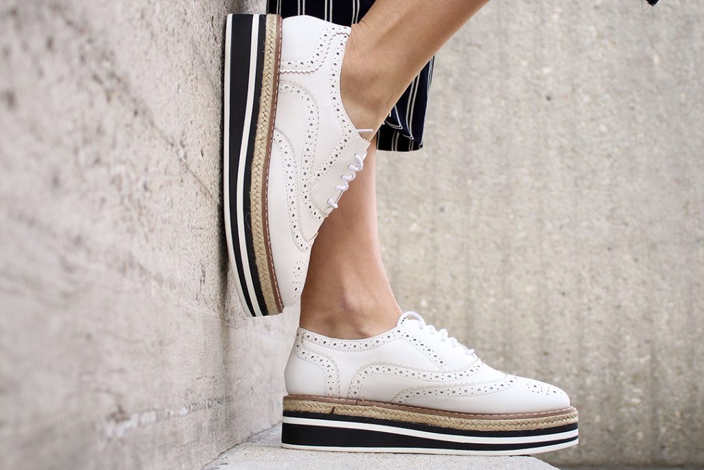 How memory foam inserts make shoes more comfortable women leaning on a step with shoes